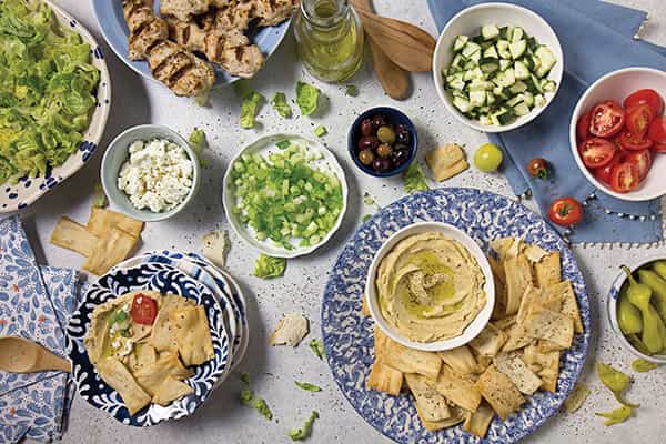 Mediterranean Nacho Bar Recipes . Let you guests serve themselves with this great nacho bar.