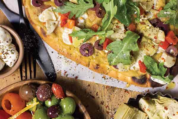 Olive Bar Flatbread Recipe. Flatbread, olive oil, red peppers, veggies and more.