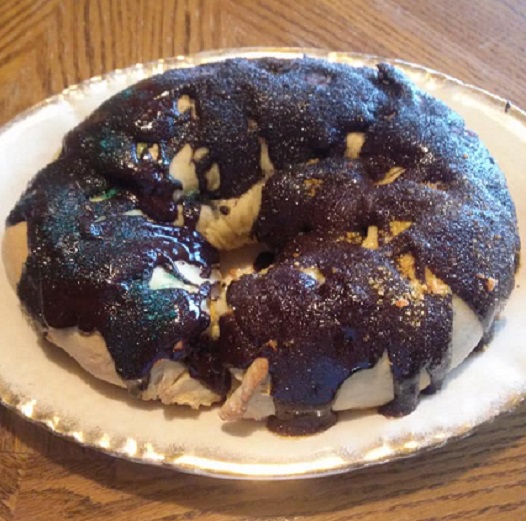 Cleta's Chocolate King Cake. This is a great cake to make for Mardi Gras!Cleta oudone herself with this awesome Chocolate King Cake. Delicious chocolate filling and devine icing. 