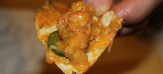 Crawfish Nachos, a delicious appetizer made with peeled crawfish tails, Cajun seasonings, and other yummy ingredients!