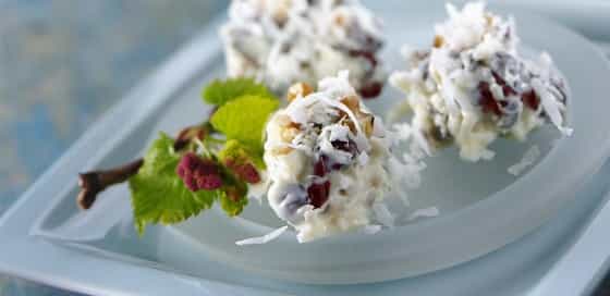 Snowball Clusters, made with cranberries, coconut, chocolate chips, and walunuts or pecans.