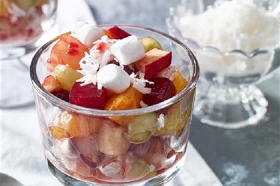 Awesome Ambrosia Salad. Delicious salad made with pineapples, oranges, cranberries, marshmallows and more.