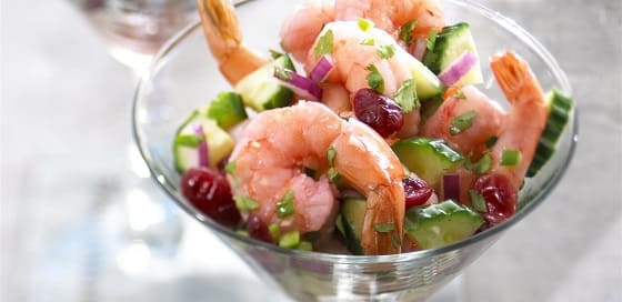 Blushing Shrimp Ceviche is made with yummy ingredients. Shrimp, cilantro, garlic, and more.