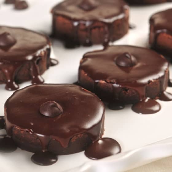 Dark Chocolate Ganache Brownie Cakes served with Dark Chocolate Ganache.