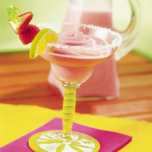 Frosty Strawberry Margaritas. Rich and creamy strawberry sorbet and evaporated milk, this fruity drink can be made in just minutes!