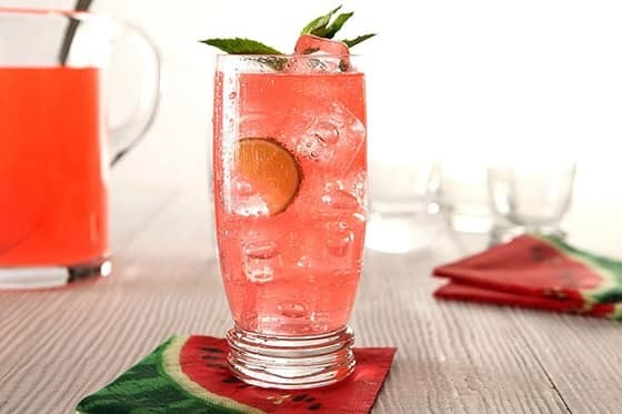 Sparkling Watermelon-Mojito Punch has a unique flavor with watermellon flavored Kool Aid, fresh lime juice and mint.